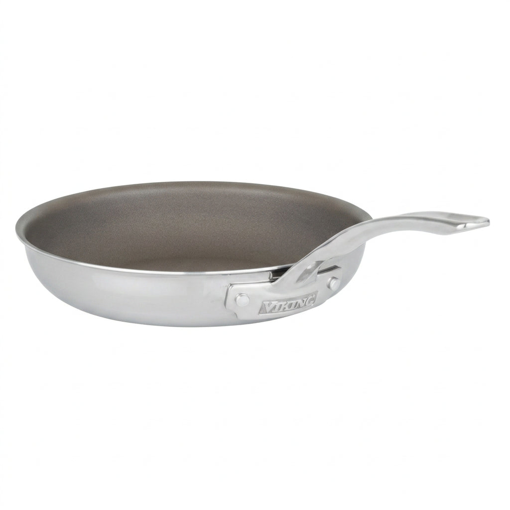 The Viking PureGlide Pro 3-Ply 10 Inch Fry Pan by Viking Culinary Products is displayed on a white background. This pan features a long, curved handle and a nonstick interior, with the Viking Culinary Products brand name visible near the handle. It is crafted from 3-ply stainless steel.