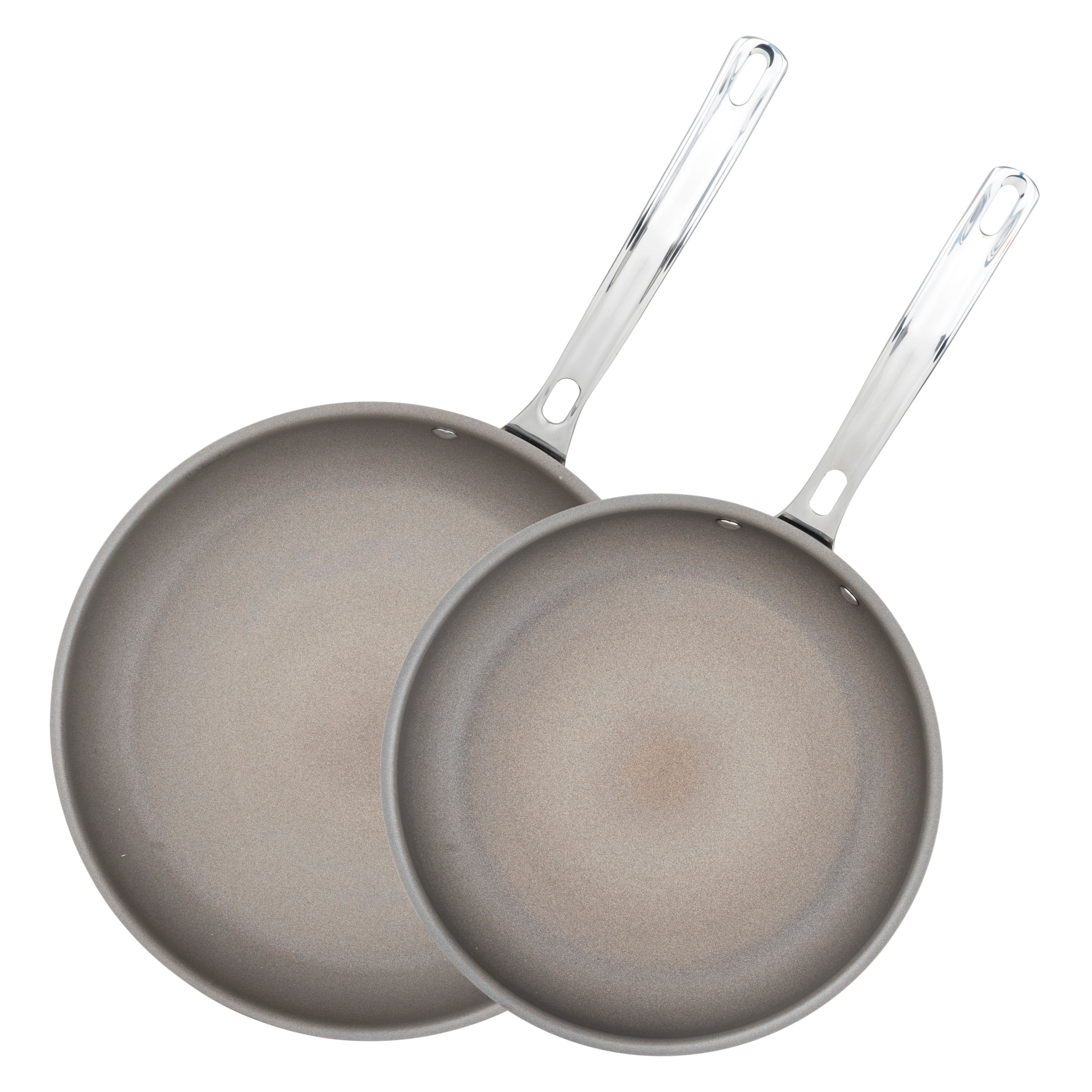 The Viking PureGlide Pro 3-Ply 2-Piece Fry Pan Set by Viking Culinary Products features overlapping 9.5" and 11" nonstick pans with metallic handles and smooth gray interiors, displayed on a white background.