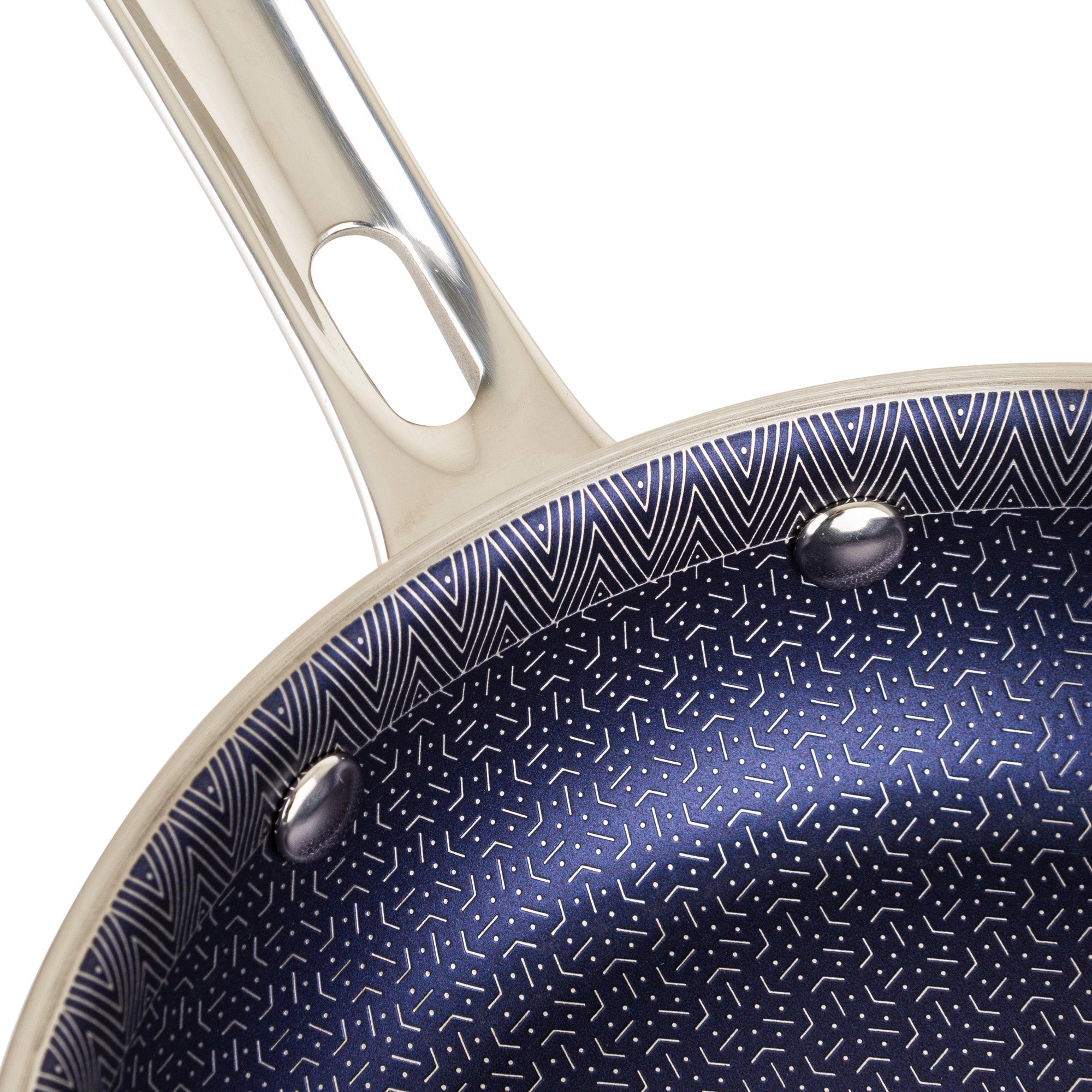 A close-up of the Viking 3-Ply Hybrid Plus 8-inch Nonstick Fry Pan by Viking Culinary Products, featuring a metallic handle and a dark blue nonstick surface with white geometric zigzag and dotted patterns, induction compatible.
