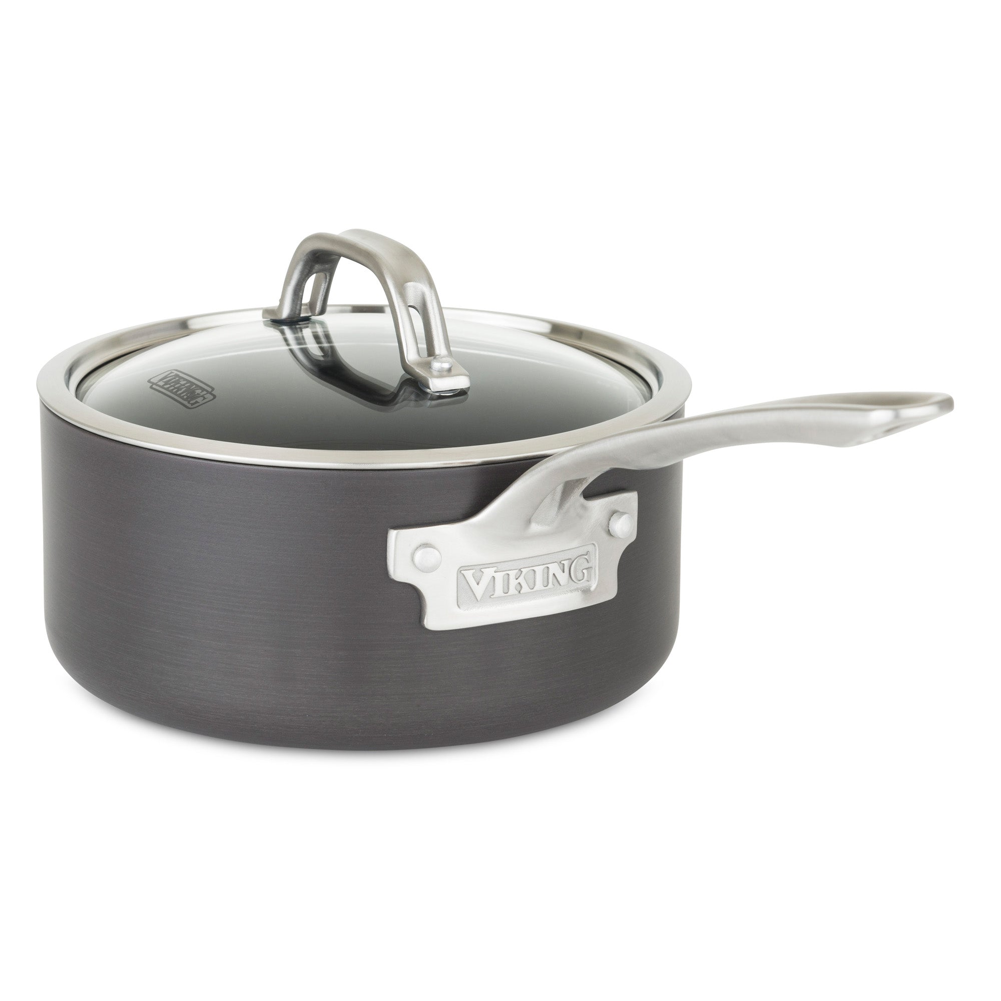 The Viking Hard Anodized Nonstick 3-Quart Sauce Pan by Viking Culinary Products features a black finish, long stainless steel handle, and a glass lid with metal accents. The brand is displayed on a metal plate on the side.
