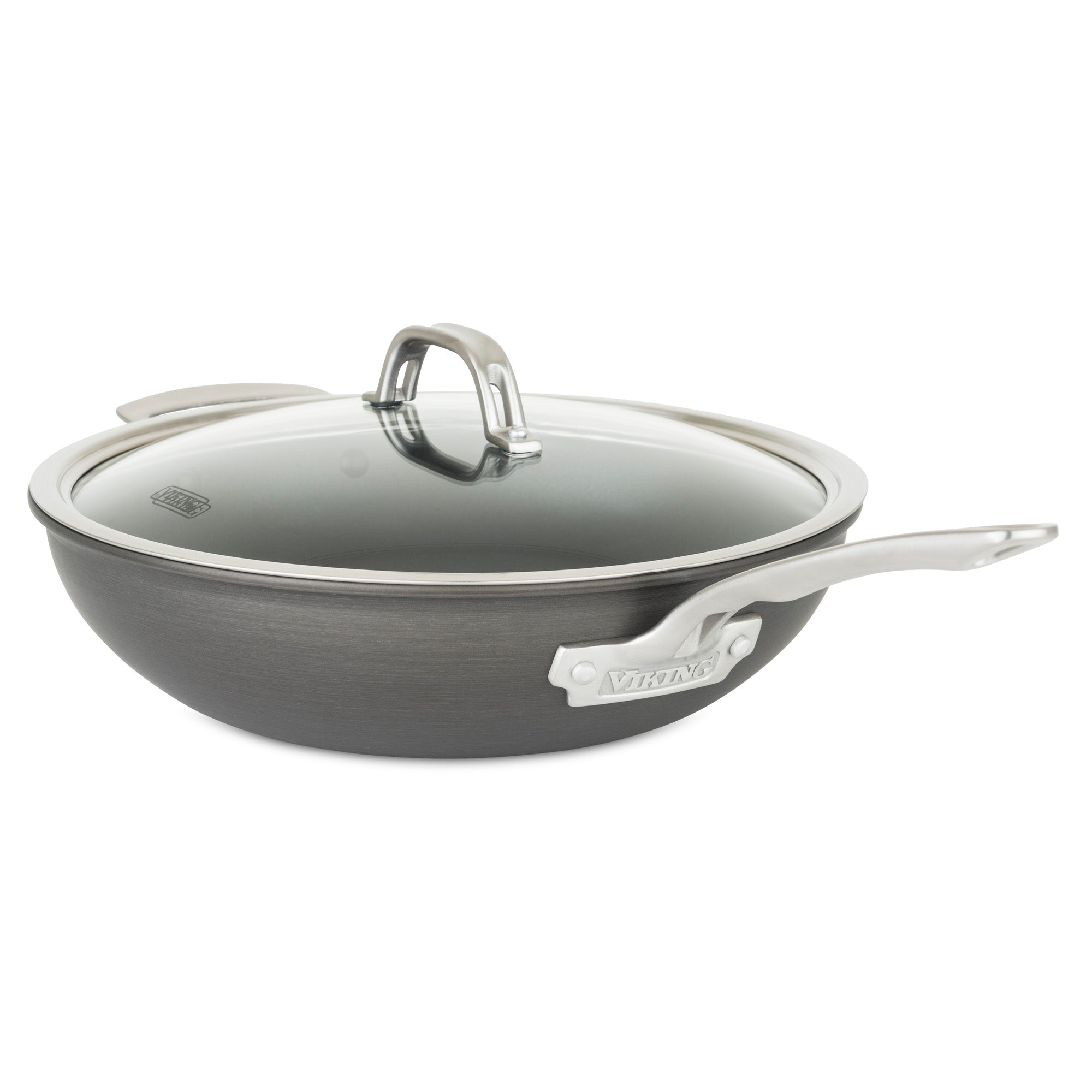 The Viking Hard Anodized Nonstick 12-Inch Covered Chefs Pan with Glass Lid by Viking Culinary Products features stainless steel, stay-cool handles for comfort and style, plus a glass, slightly domed lid for added convenience in your kitchen.