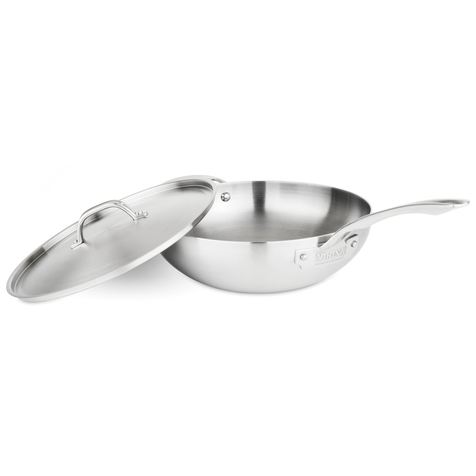 The Viking Professional 5-Ply Stainless Steel 12-Inch/5.6-Quart Chefs Pan by Viking Culinary Products features a long handle and a brushed metal lid, which rests tilted against the induction-ready pan, revealing its empty interior.