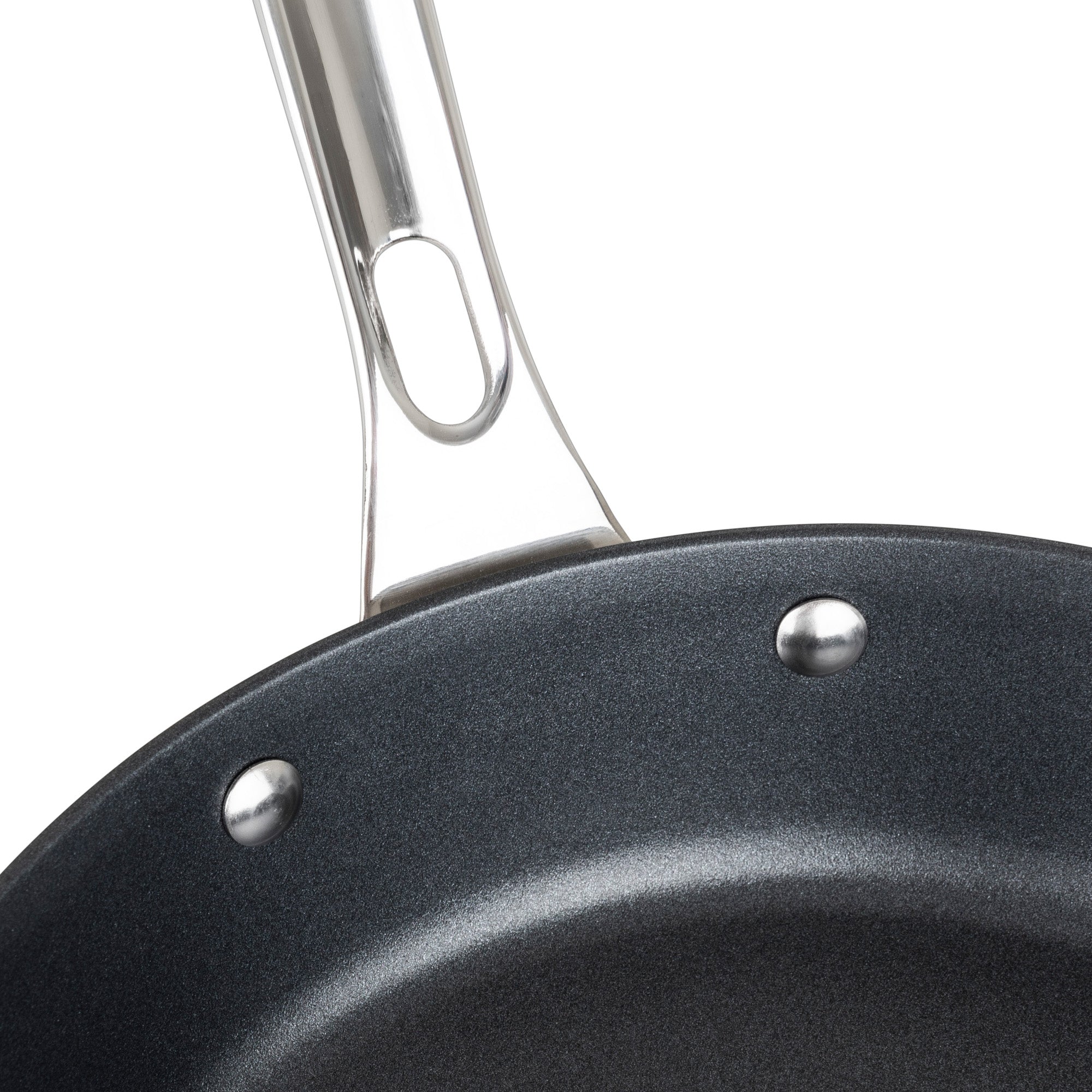 Close-up of the Viking Contemporary 3-Ply Stainless Steel 10-Inch Nonstick Fry Pan by Viking Culinary Products, featuring a black nonstick surface, silver stay-cool handle, and three metal rivets securing the handle.