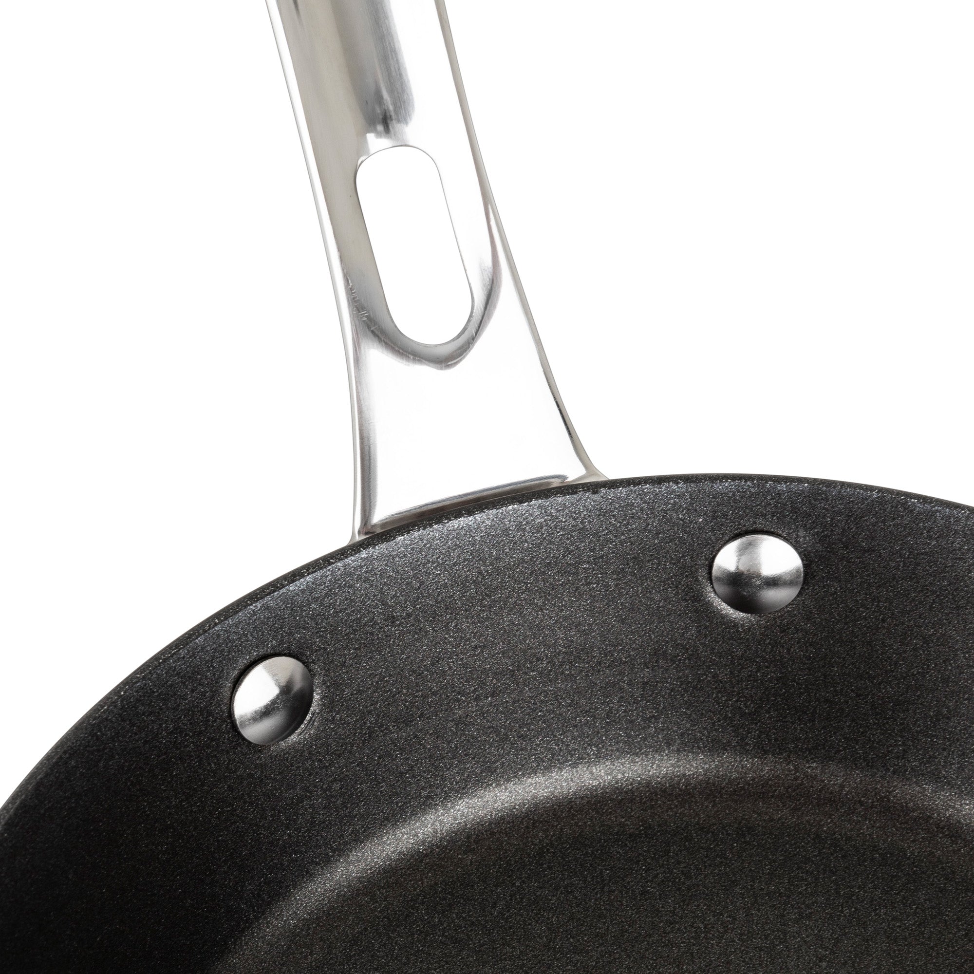 Close-up of the Viking Contemporary 3-Ply Stainless Steel 8-Inch Nonstick Fry Pan by Viking Culinary Products, featuring an induction-compatible black nonstick surface and a stainless steel handle attached with three rivets.