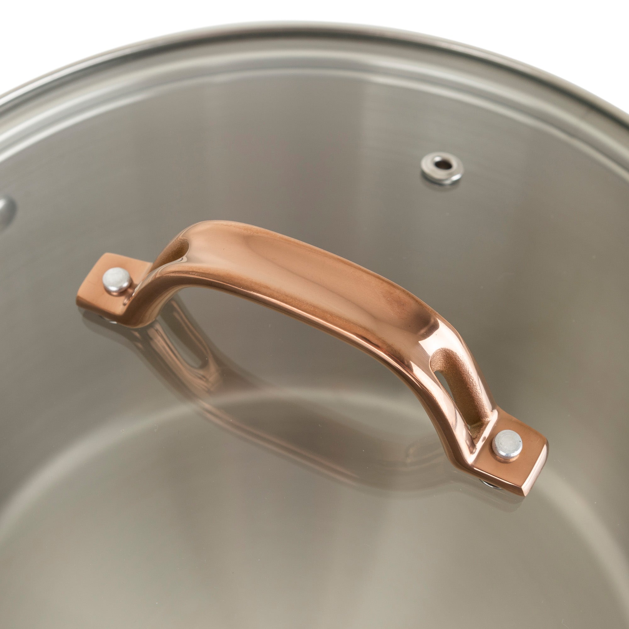 Close-up of a Viking 3-Ply 11 Piece Black and Copper Cookware Set glass lid by Viking Culinary Products, featuring a shiny stainless steel stay-cool handle secured by two fasteners, with its reflection visible on the smooth glass surface.