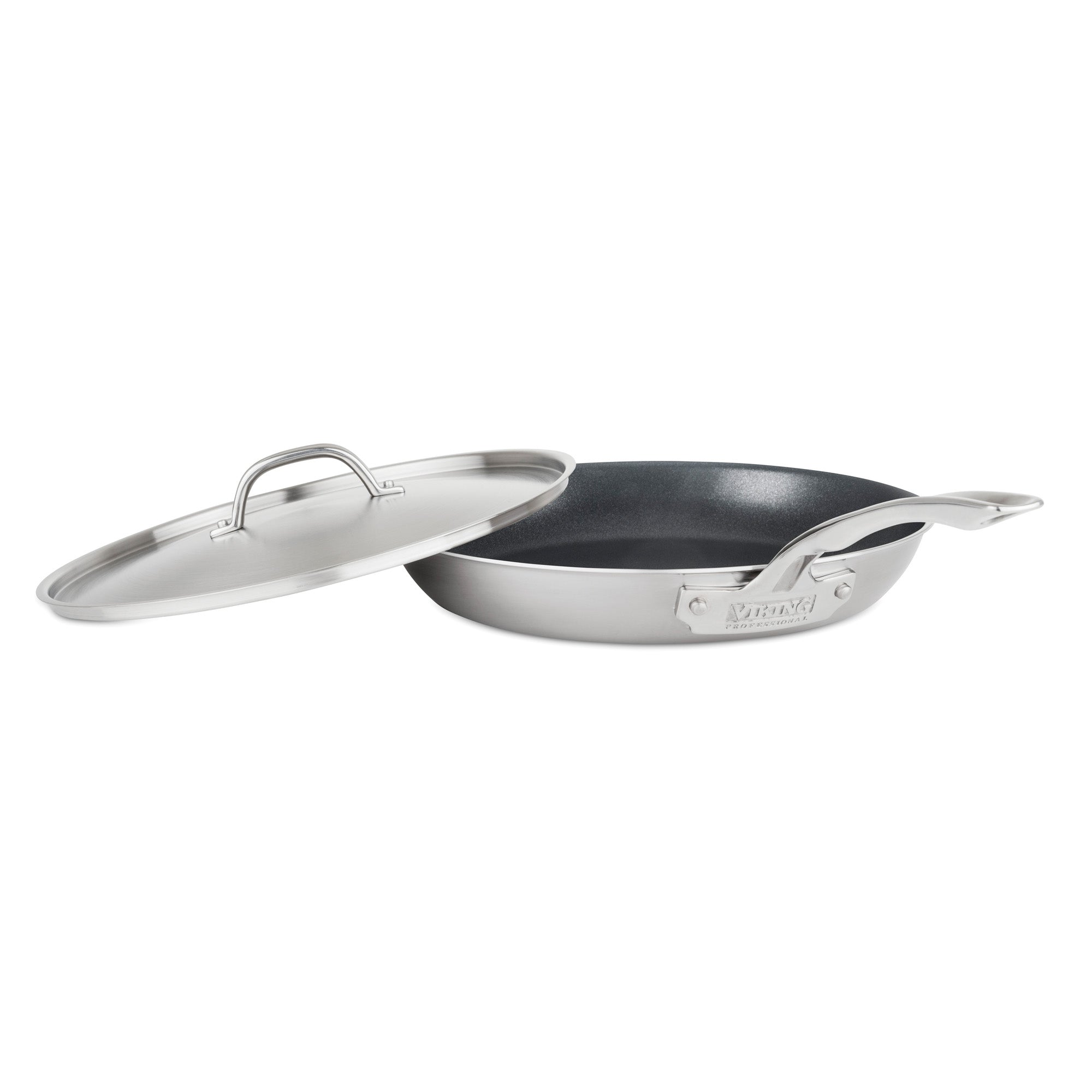 The Viking Professional 5-Ply Stainless Steel Covered Nonstick 12-Inch Fry Pan by Viking Culinary Products is shown slightly tilted left, with its matching lid resting at an angle beside the pan.