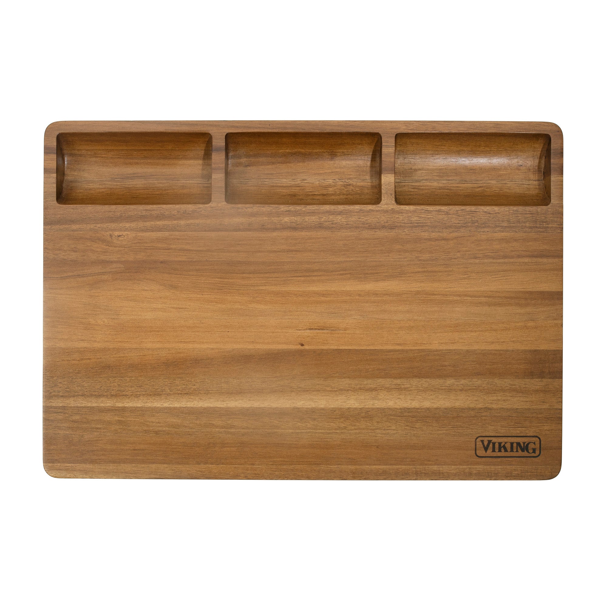 The Viking Culinary Products Acacia 20-Inch Reversible Butcher Block Prep and Carving Board features three shallow top compartments, a juice groove, and VIKING engraved in the bottom right corner.