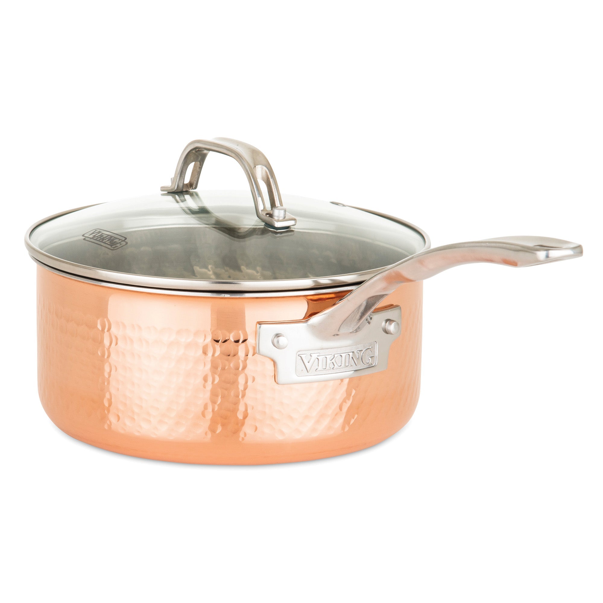 The Viking Culinary Products 3-Ply Hammered Copper Clad 10-Piece Cookware Set features stainless steel interiors, long handles, and glass lids, with the brand name engraved on a metal plate to highlight quality craftsmanship.