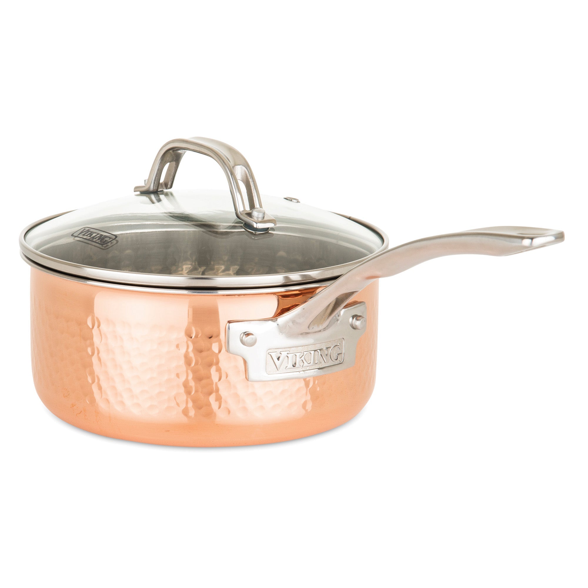 The Viking 3-Ply Hammered Copper Clad 10-Piece Cookware Set from Viking Culinary Products features glass lids, stainless steel interiors, long steel handles, and a hammered copper finish with a metal VIKING label on the side.