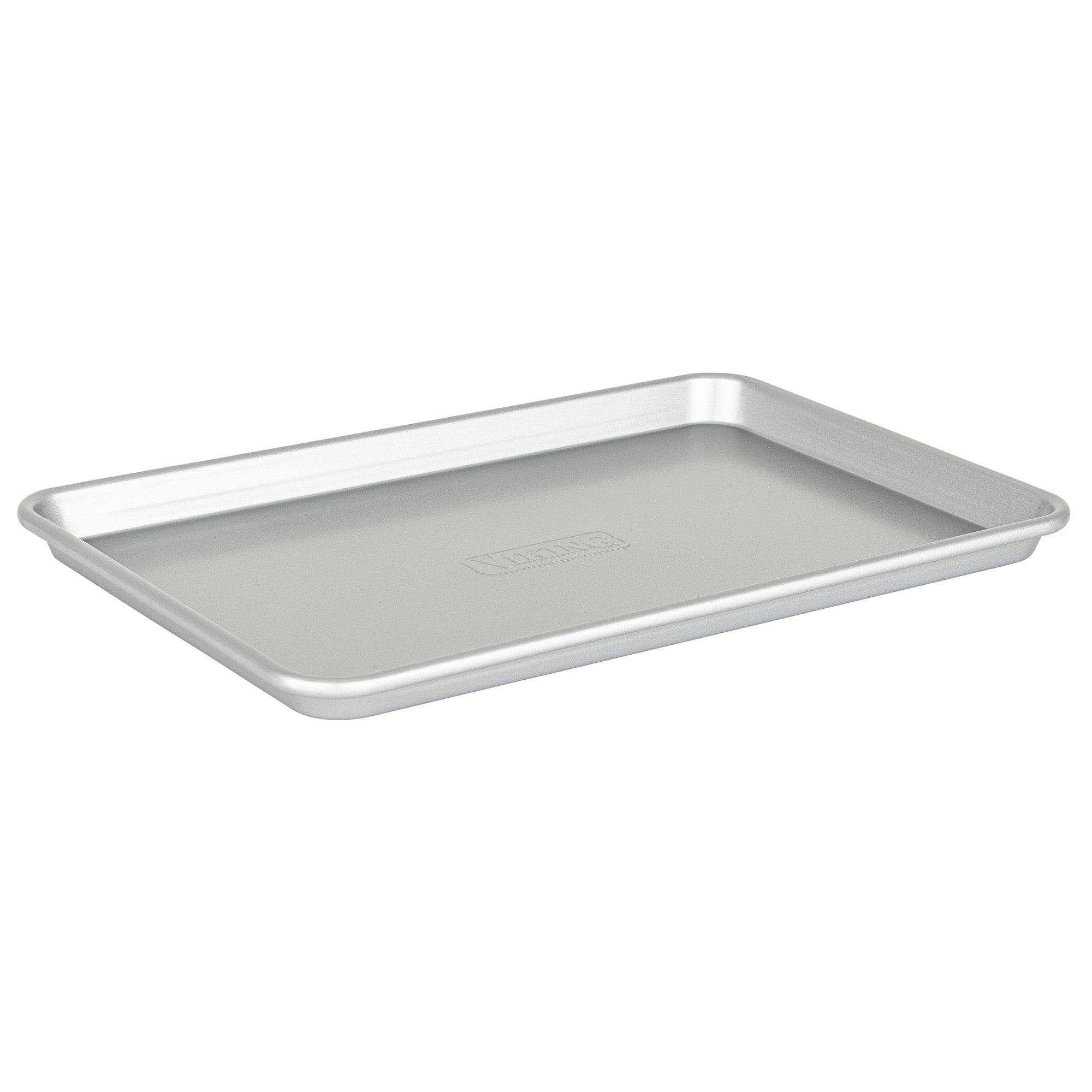 The Viking Aluminized Steel Nonstick 15-inch Baking Sheet with Rack from Viking Culinary Products is a rectangular, silver-colored metal sheet with raised edges, shown angled on a white background.