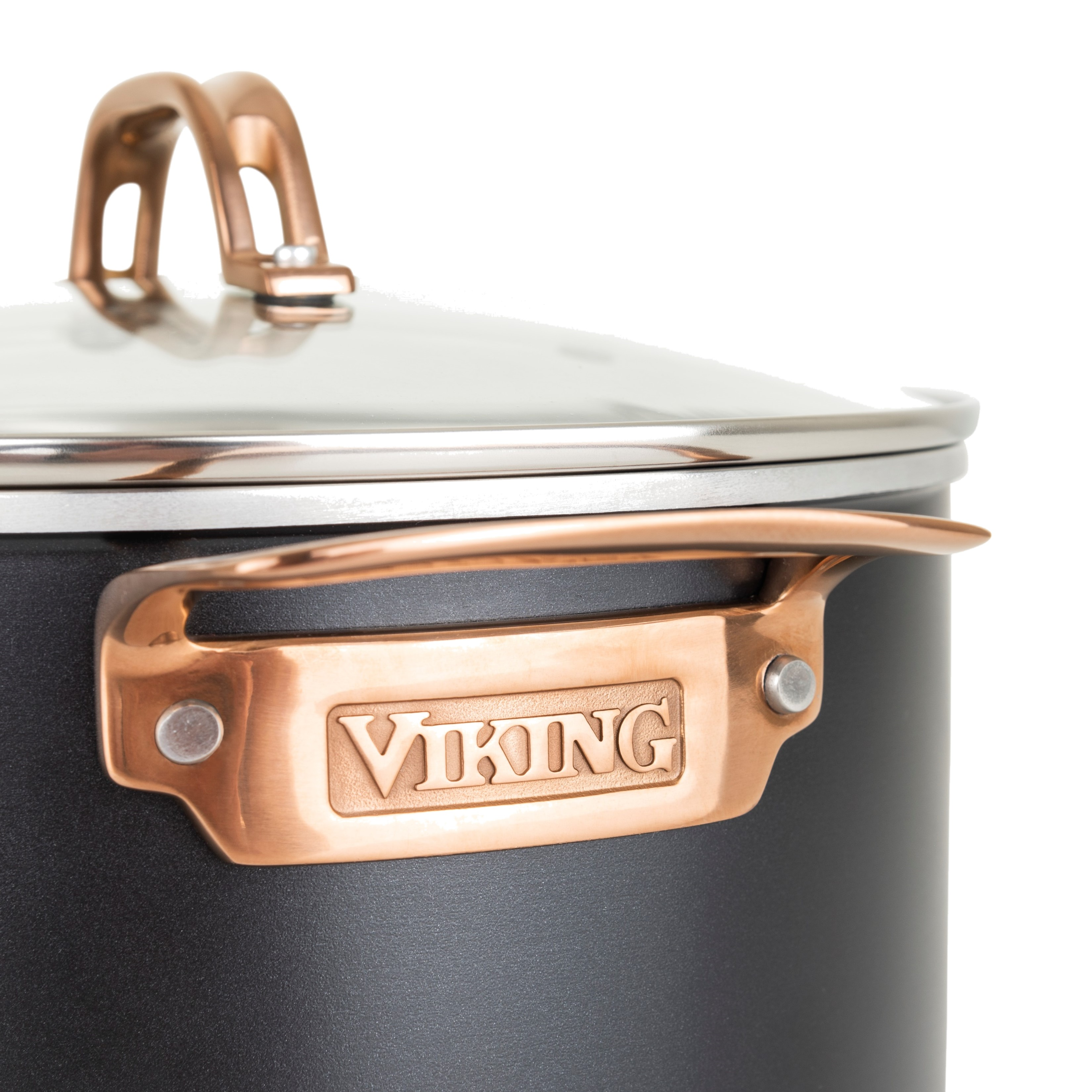 Close-up of a Viking Culinary Products 3-Ply Black and Copper 5 Quart Dutch Oven with a glass lid and copper-colored handle, featuring the brand name engraved on the induction-compatible handle.