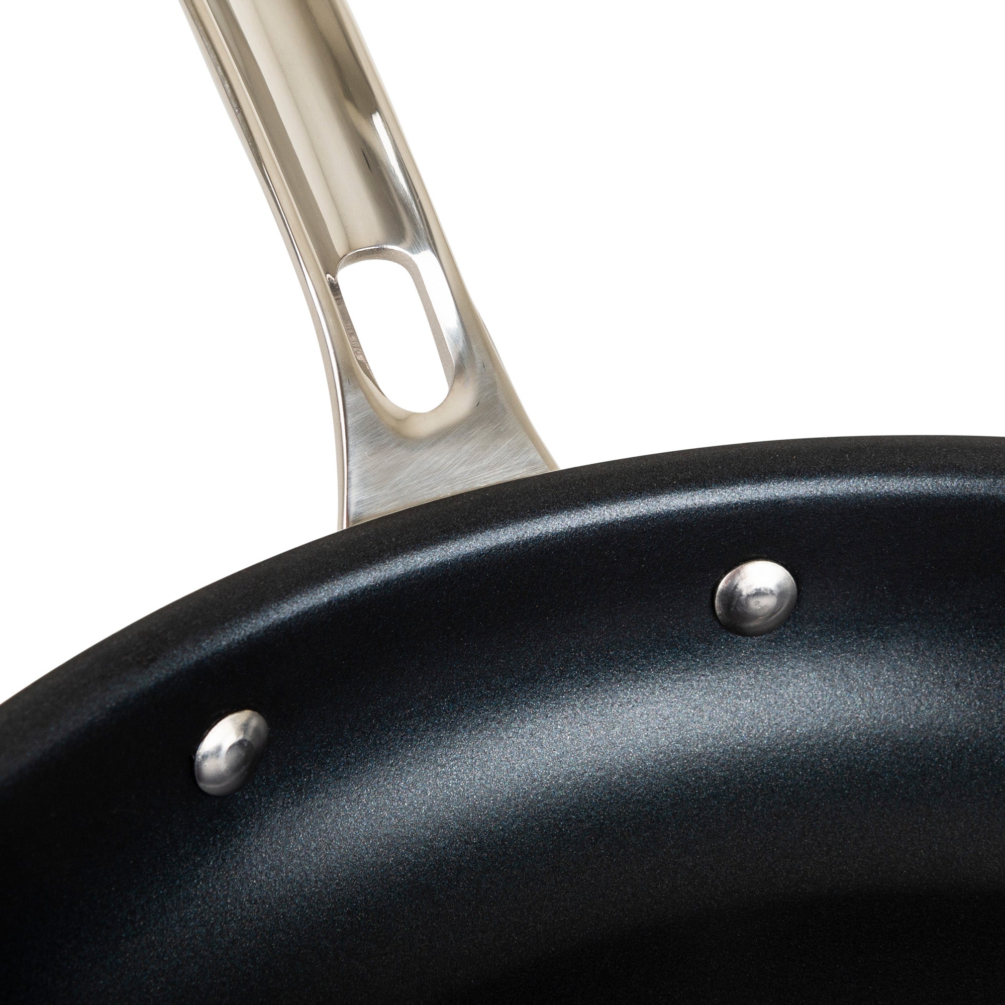 Close-up of a Viking Culinary Products 3-Ply Stainless Steel 2-Piece Nonstick Fry Pan Set, black with a metal handle secured by two rivets, shown against a white background.