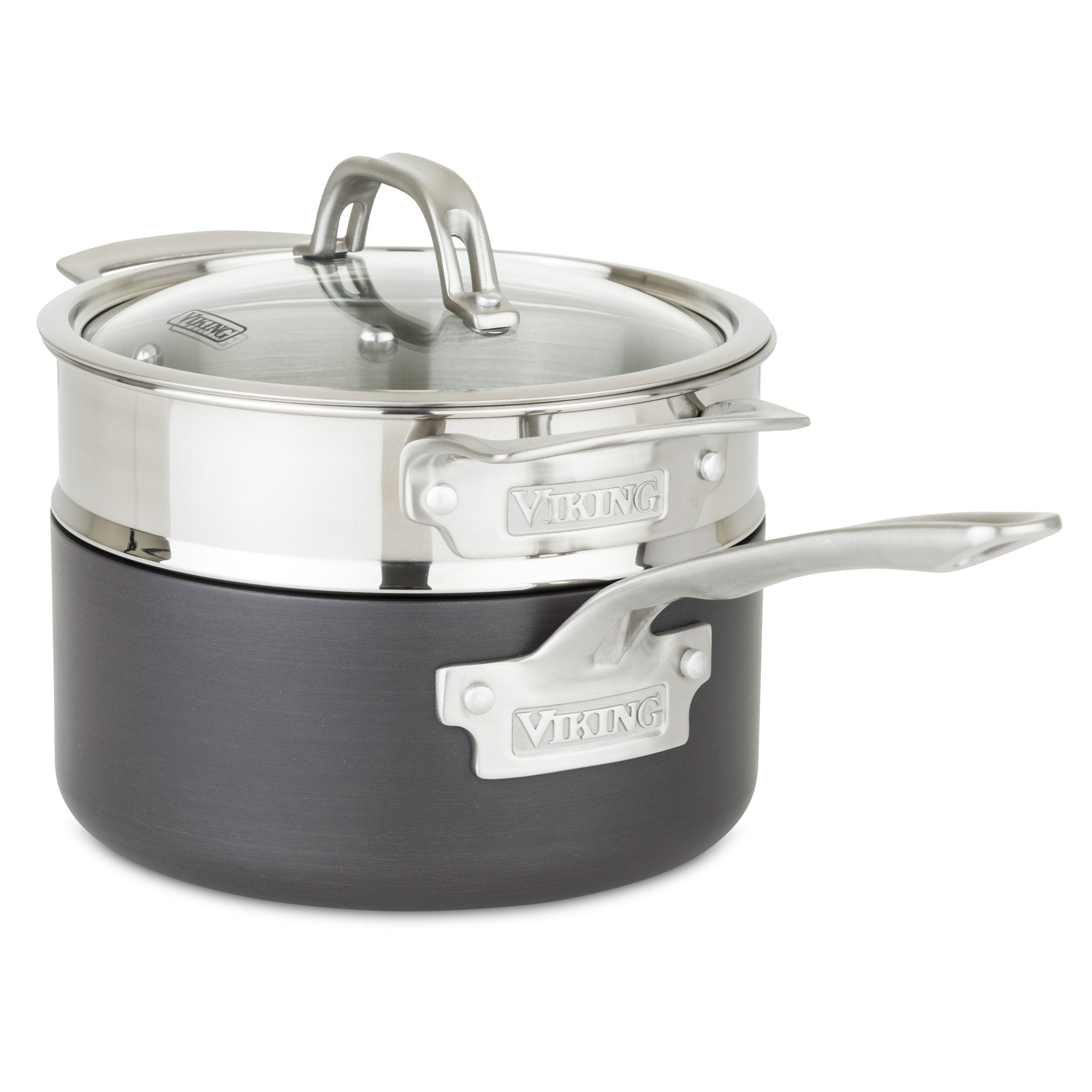 A Viking Culinary Products saucepan with a black and silver hard anodized exterior, metal handles, and clear glass lid sits atop the Viking Stainless Steel Universal Steamer Insert and Colander.