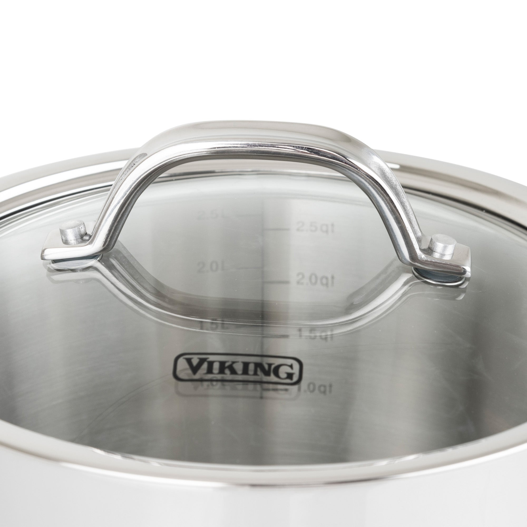 A close-up of the Viking Contemporary 3-Ply 3.4-Quart Sauce Pan by Viking Culinary Products, showing its stainless steel build, glass lid, Stay-Cool Handles, interior measurement markings, and the Viking logo on the side.