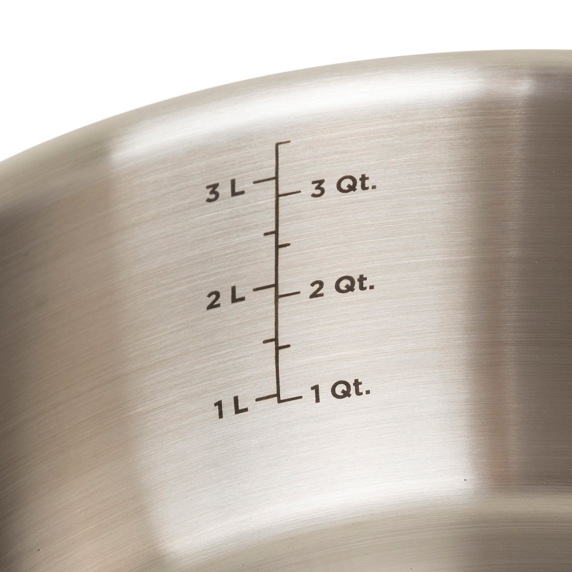 Close-up of a Viking Culinary Products 3-Ply Black and Copper Pot from the 11-piece set, featuring a smooth, reflective stainless steel interior with 1-3 liter and quart markings and stay-cool handles for safe cooking.