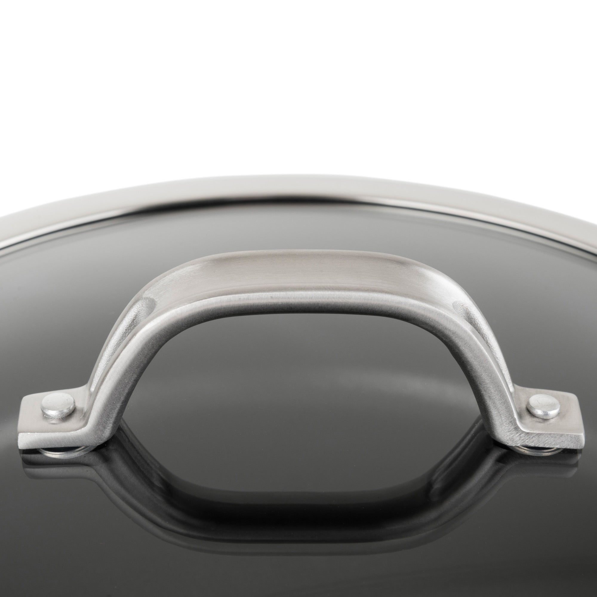 Close-up of the stainless steel stay-cool lid handle on the Viking Hard Anodized Nonstick 1-Quart Sauce Pan by Viking Culinary Products, reflected on its glossy anodized aluminum surface.