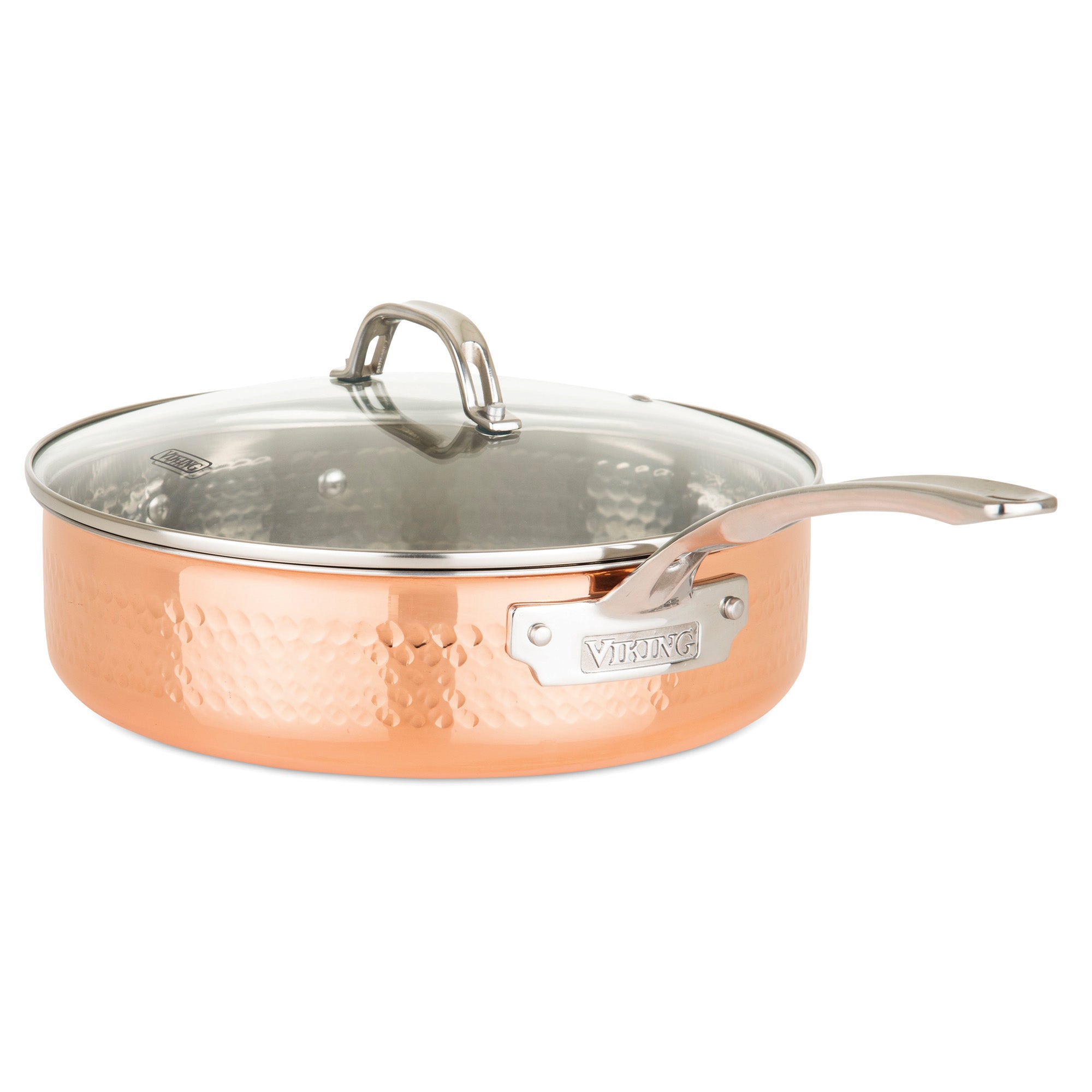 The Viking 3-Ply Hammered Copper Clad 10-Piece Cookware Set by Viking Culinary Products features hammered copper, long stainless steel handles, surgical grade stainless steel interiors, and vented glass lids with metal handles.
